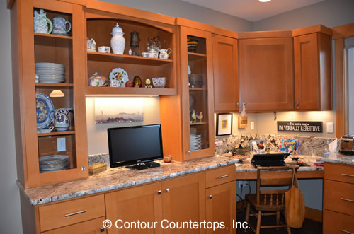 Wooden cabinets and granite countertop